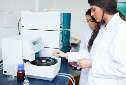 Students using a centrifuge Students using a centrifuge in a laboratory